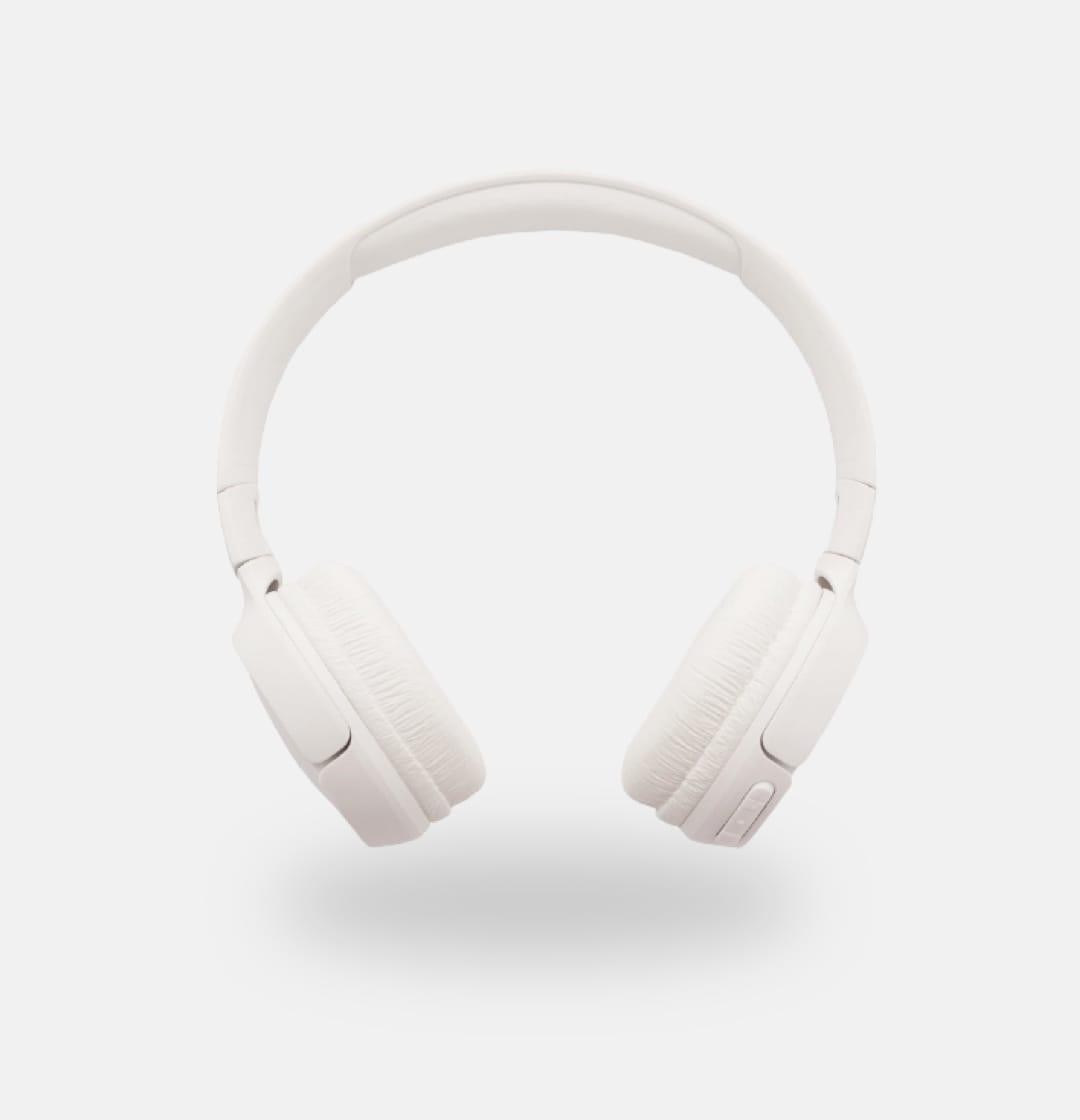 A pair of white headphones on a white background. The headphones are wireless, on-ear headphones. They have a plastic headband that curves around the top of the headphones and connects the two ear cups. The ear cups are oval-shaped and covered in a white, soft-looking material.