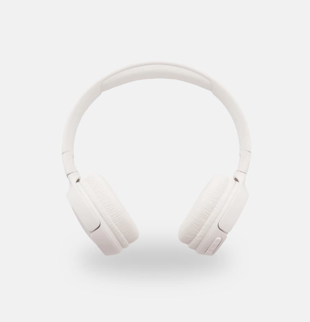A pair of white headphones on a white background. The headphones are wireless, on-ear headphones. They have a plastic headband that curves around the top of the headphones and connects the two ear cups. The ear cups are oval-shaped and covered in a white, soft-looking material.
